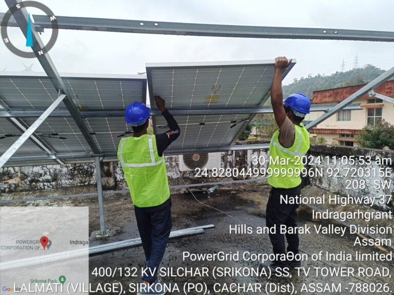 Engineer installing a solar panel at a Powergrid project